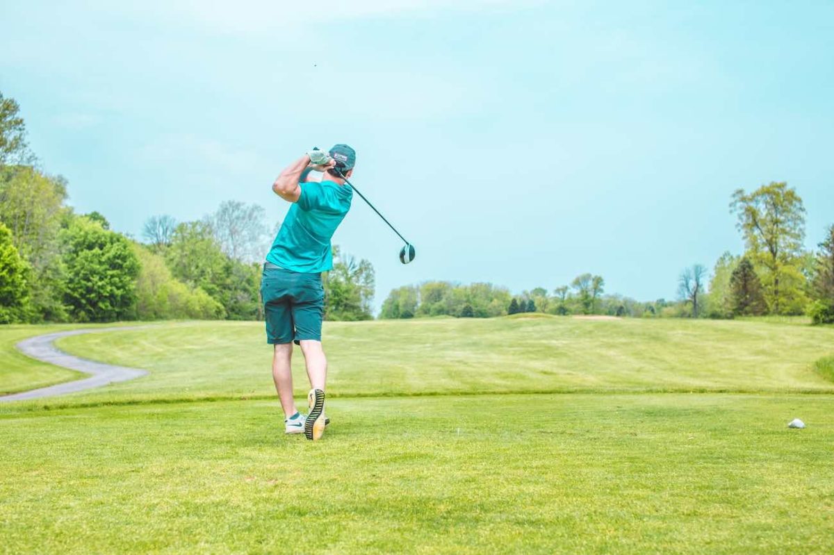 Man driving a slice from tee